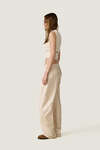 Beige top with a modern waist cut-out - SS26