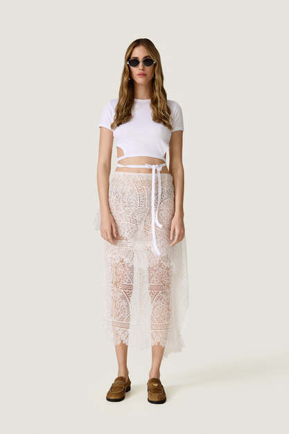 Short white top with side waist cut-outs - SS26