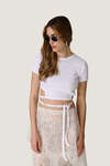 Short white top with side waist cut-outs - SS26