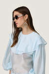 Airy baby blue chiffon blouse with oversized ruffle details - SS26