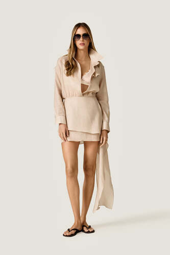 Beige loose dress with an asymmetric cut and flowing side detail - PNK Casual