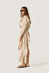 Beige loose dress with an asymmetric cut and flowing side detail